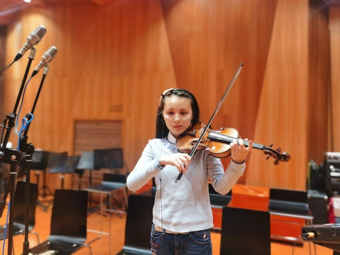 　马奕菲在北京练习闭幕式演奏曲目。