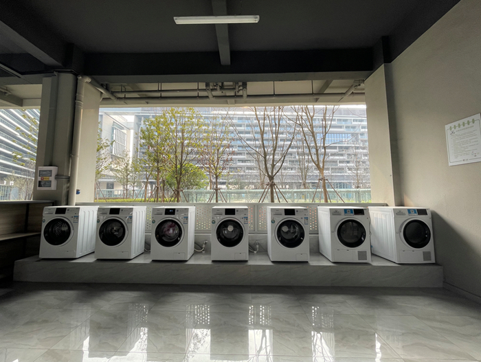 宁巢明石公寓共享洗衣机。