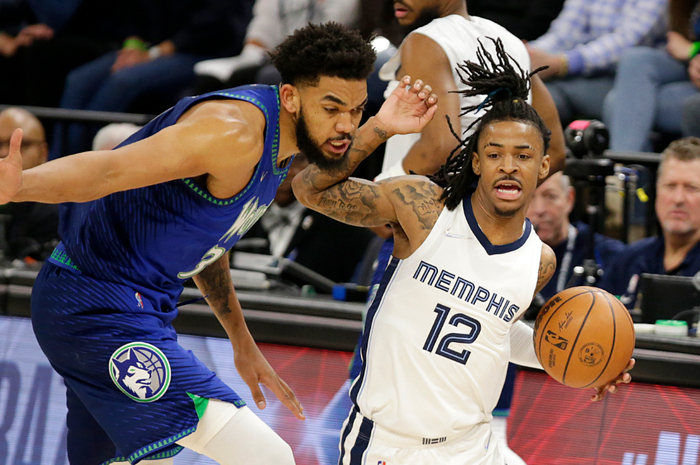 莫兰特带球进攻，本赛季他连续创造个人得分新高。 图/新华社