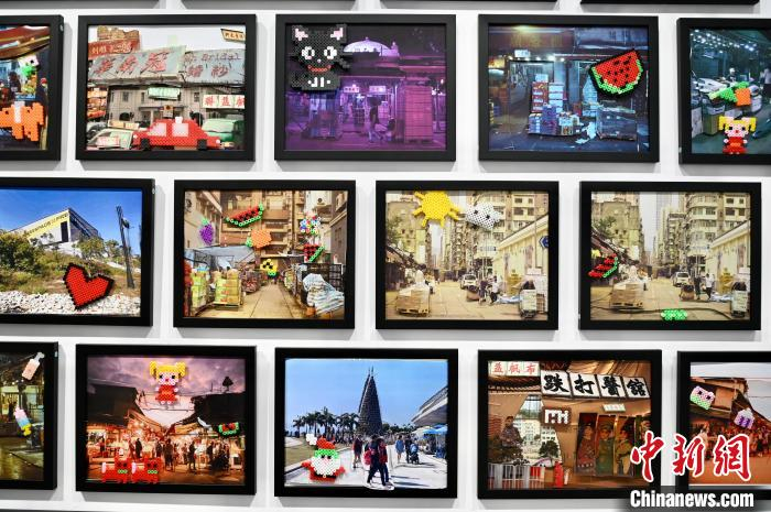 中小学生创作的《拼豆拼贴画》，记录西九龙社区的画面。　李志华 摄