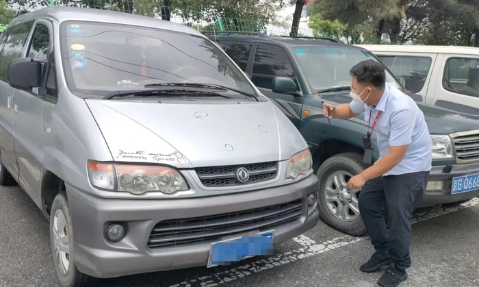 定损员现场查勘/人保财险北京分公司供图