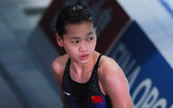 全红婵在比赛中，她和队友白钰鸣摘得混合全能金牌。  图/新华社