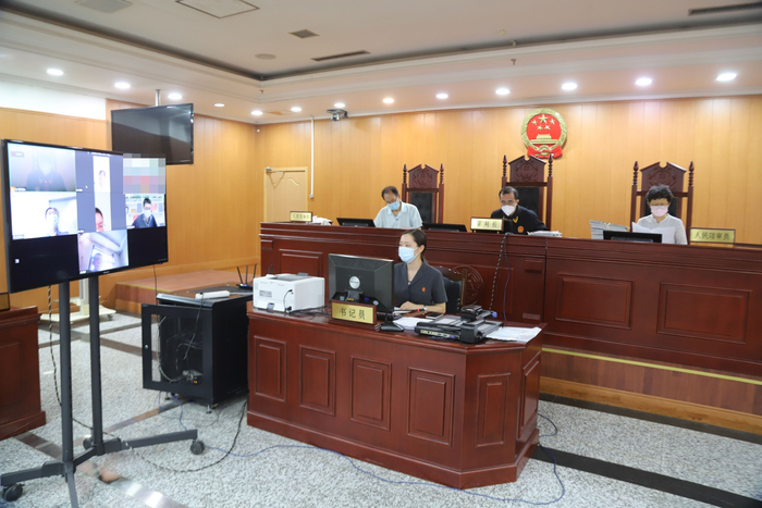 7月8日上午，庭审现场。  房山法院供图