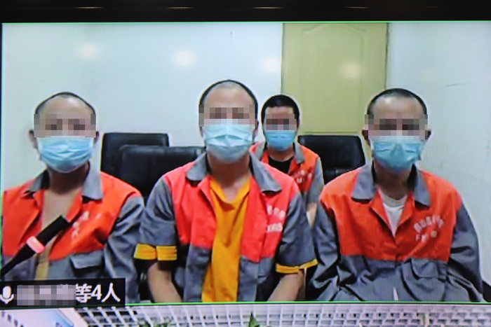 7月8日上午，庭审现场。  法院供图