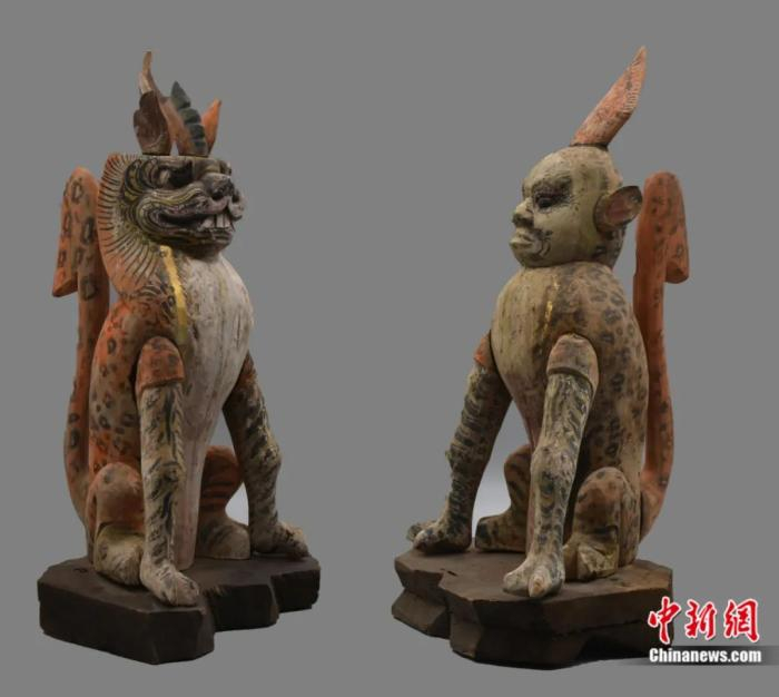 慕容智墓出土的镇墓兽。中新社发 甘肃省文物考古研究所 供图