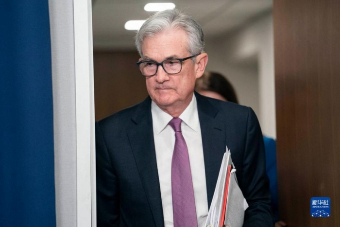 7月27日，美联储主席鲍威尔在华盛顿出席新闻发布会，当天美联储宣布加息75个基点。新华社记者刘杰摄