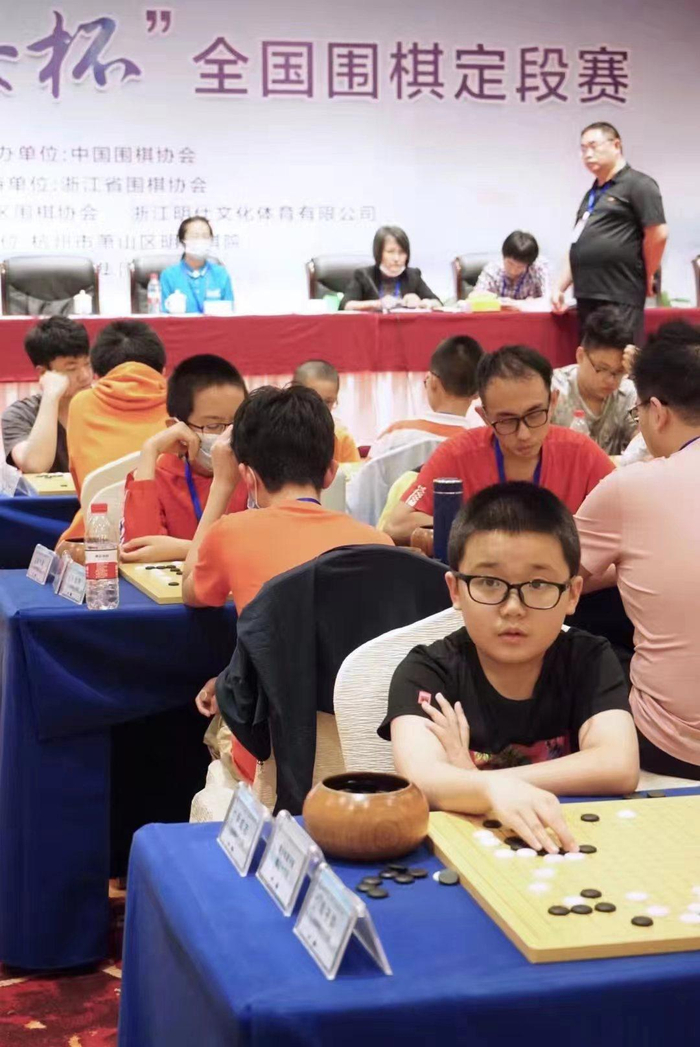 尹成志参加定段赛。  资料图/受访者供图