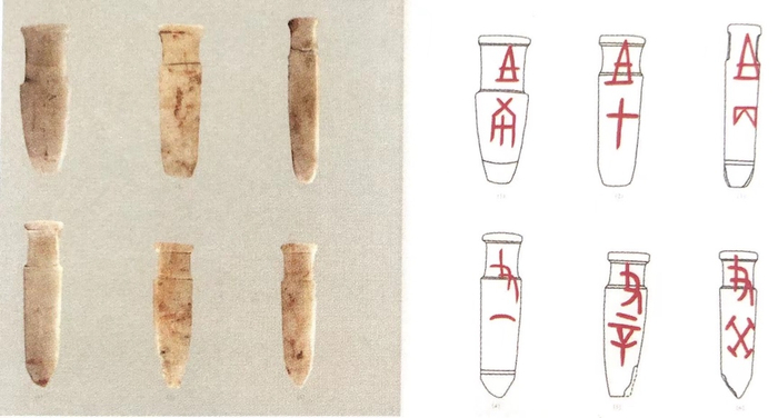 图30 安阳后岗M3出土的朱书玉柄形器