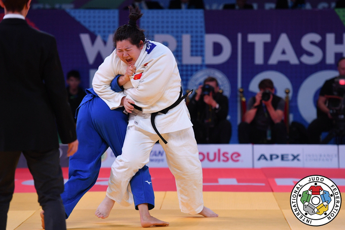 铜牌争夺战徐仕妍（白）为中国队拿下一分