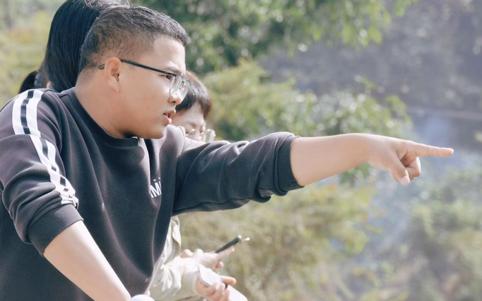 杨鸿简在咖啡园里。受访者供图