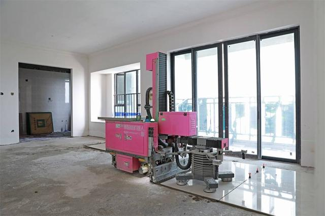 ▲地砖铺贴机器人。