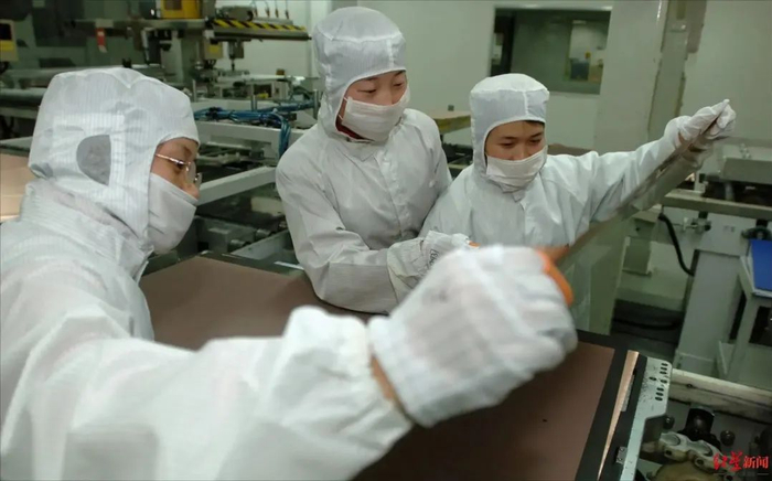 ↑江苏昆山，沪士电子有限公司 图据视觉中国