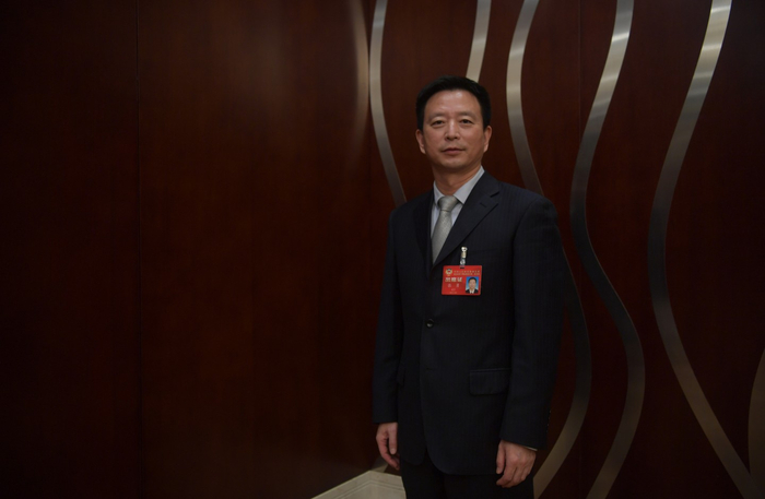 北京市政协委员，北京市园林绿化局（首都绿化办）党组成员，北京市公园管理中心党委书记、主任张勇。  新京报记者 李木易 摄