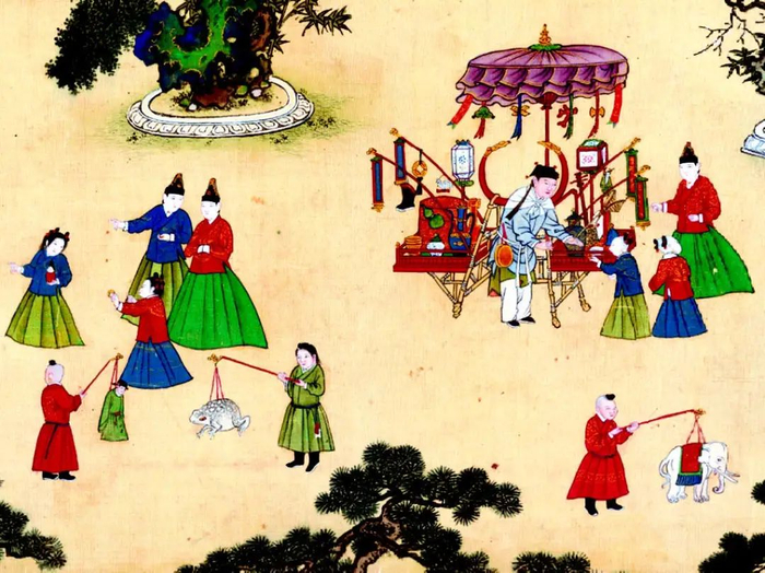 手执各式灯笼的陪侍小宦官，（明）佚名：《明宪宗元宵行乐图》局部，中国国家博物馆藏