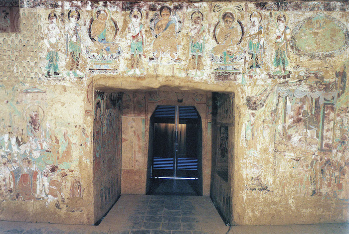 图1-6 《维摩变》  初唐  莫高窟第220窟主室东壁