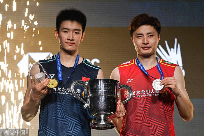 李诗沣（左）和石宇奇。