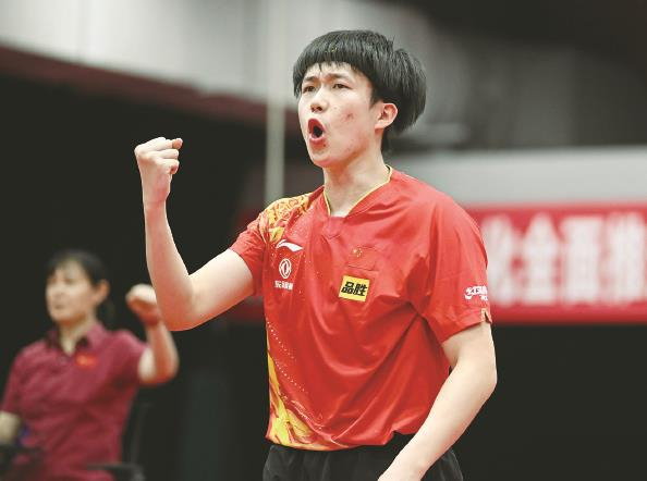             王楚钦在比赛中庆祝得分  图  新华社          