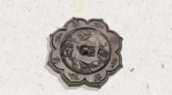 唐双鸾双兽纹菱形铜镜