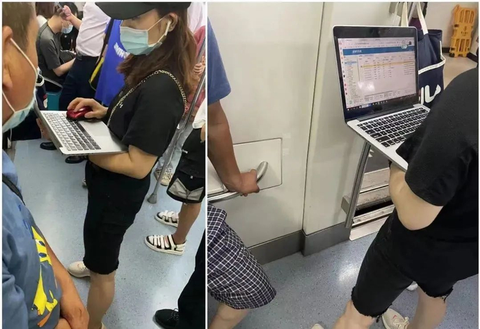 强子拍下的地铁上忙碌的人们