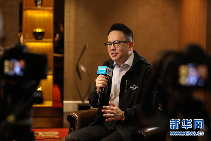 全国政协委员、澳门啤酒有限公司联席董事长蔡明威。新华网 陈延特 摄