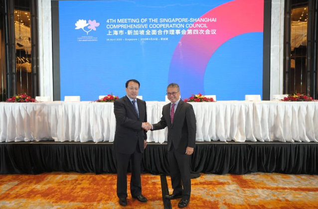 龚正与新任沪新理事会新方主席唐振辉