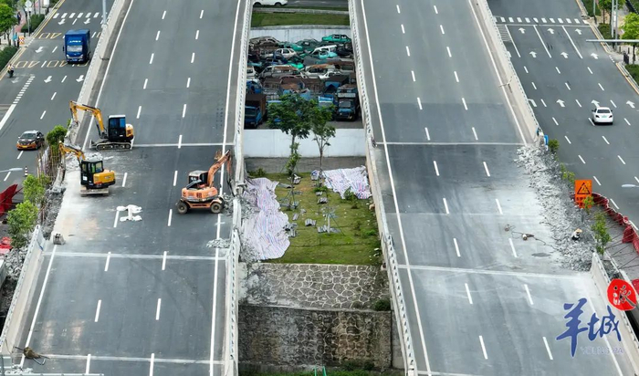 ▲5月5日，正在养护维修的广州南大干线四涌主线桥路段，有机械和施工人员工作。