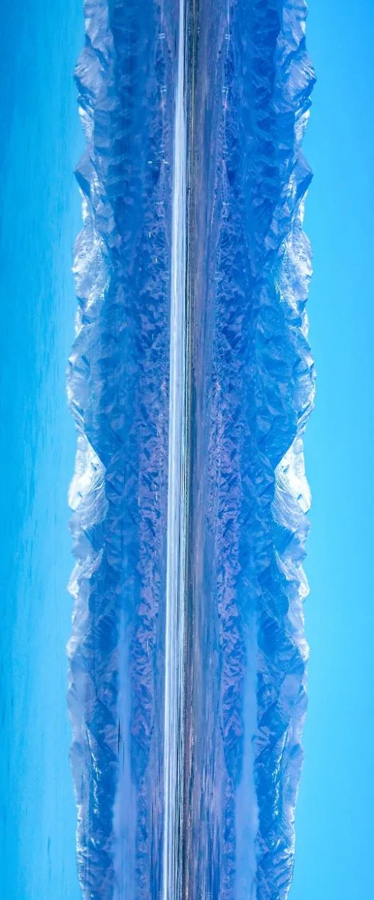 雪山倒映在“天空之境”中。王生荣 摄