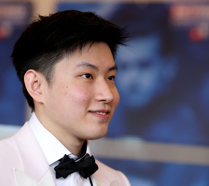 赵心童在10名球员中受罚最轻，他表态将重回赛场，重新证明自己。 资料图/新华社