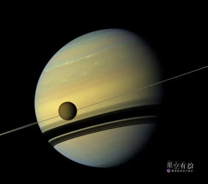 “卡西尼”号探测器拍摄的土星与土卫六。（来源：美国国家航空航天局官方网站）