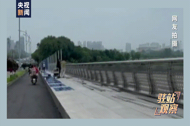 安徽蚌埠龙湖大桥上的铁皮围挡 （央视新闻报道截图）