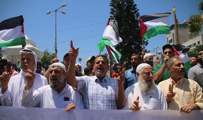 当地时辰2023年7月3日，加沙城，巴勒斯坦东谈主参加配合请愿算作，抗议以色列垂危杰宁。