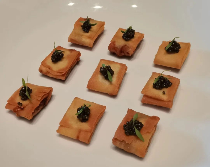 脆皮春卷腊肉搭配上鱼子酱令人垂涎欲滴。城口县委宣传部供图