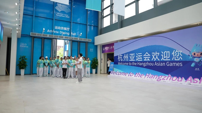 杭州亚运会赛会志愿者在亚运村到岗培训。刘吉龙摄