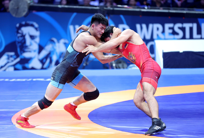 摔跤——世锦赛首日赛况|摔跤|世锦赛|自由式摔跤_新浪新闻