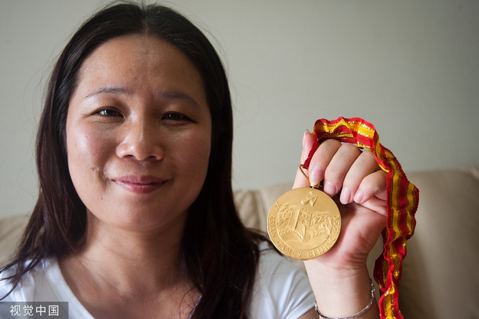 邢芬和她的亚运金牌。