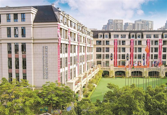 深圳市坪山区弘金地学校 中西融汇育未来之才 两翼齐飞树特色品牌
