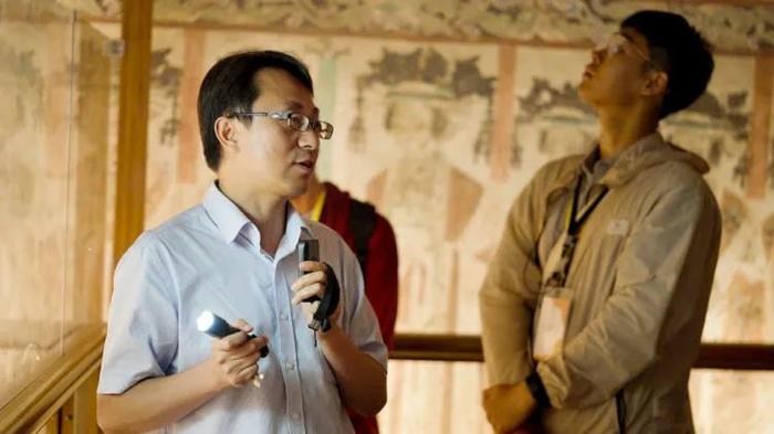 讲解员是守护者，更是弘扬敦煌文化的种子。（图/由被访者提供）