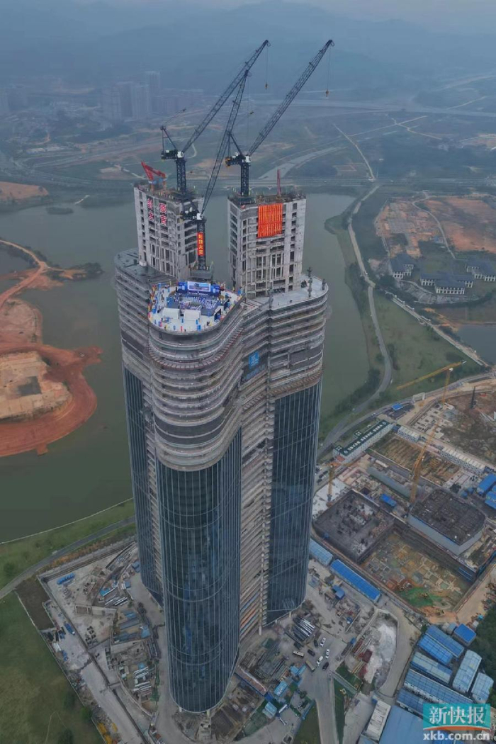 黄埔最高地标"知识塔"封顶 知识城中新合作迈向"新高度"|塔楼|新加坡