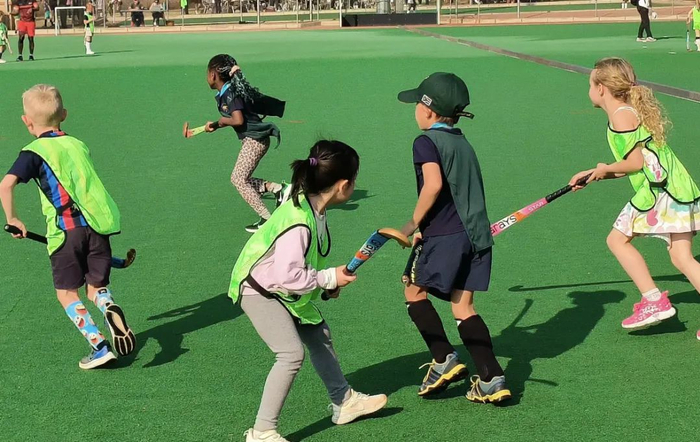 玉米参加曲棍球比赛