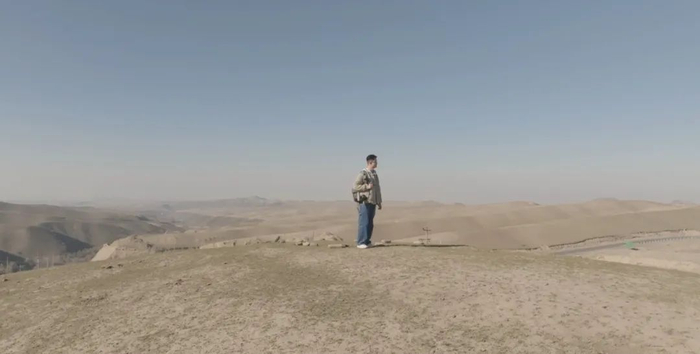 ▲在新疆做志愿者的胡鑫