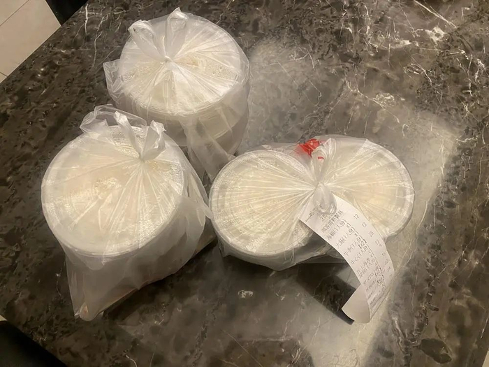 捞化用了10个包装盒，收了16元打包费。张文章/摄