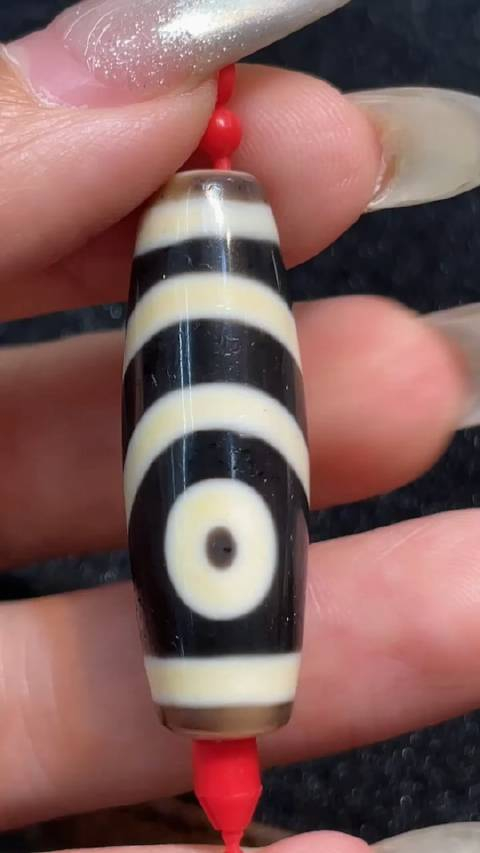 藏传二眼天珠尺寸115x35mm左右品相完美风化细腻