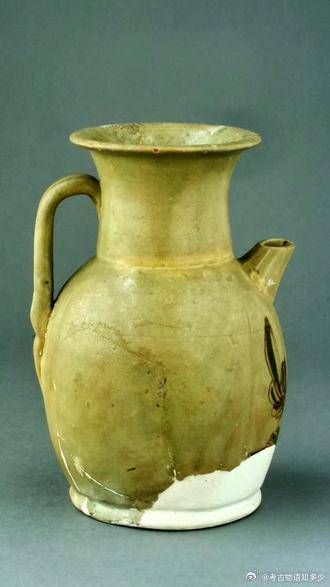 唐代长沙窑青釉褐绿彩凤鸟纹执壶……__财经头条