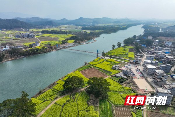 2024年3月2日,湖南省永州市江华瑶族自治县沱江镇羊古车村,碧绿的潇水