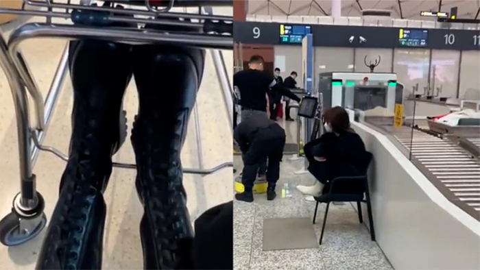 尴尬美女过安检时被要求脱长筒靴大庭广众露出脚当场脸红社死