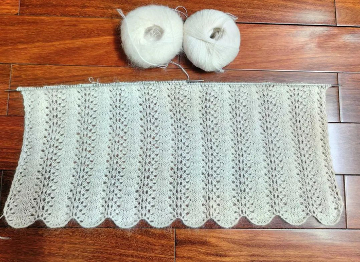 编织后片:长尾起针法起173针,不加不减织约59cm,开始引返斜肩2-9-5,2