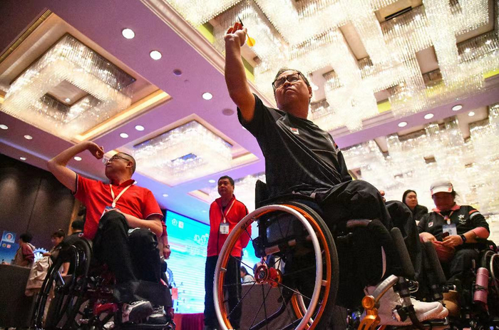 这道弧线飞出拼搏精神中国残疾人冰雪运动季飞镖项目推广活动在沪开展
