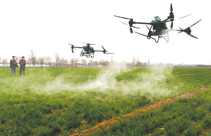 无人机植保作业__财经头条