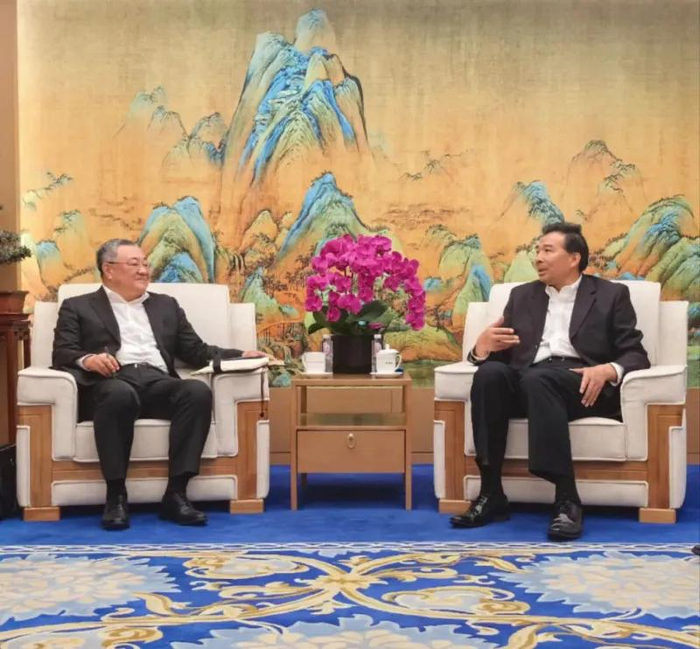 罗照辉（右）会见傅聪。图源：国合署网站