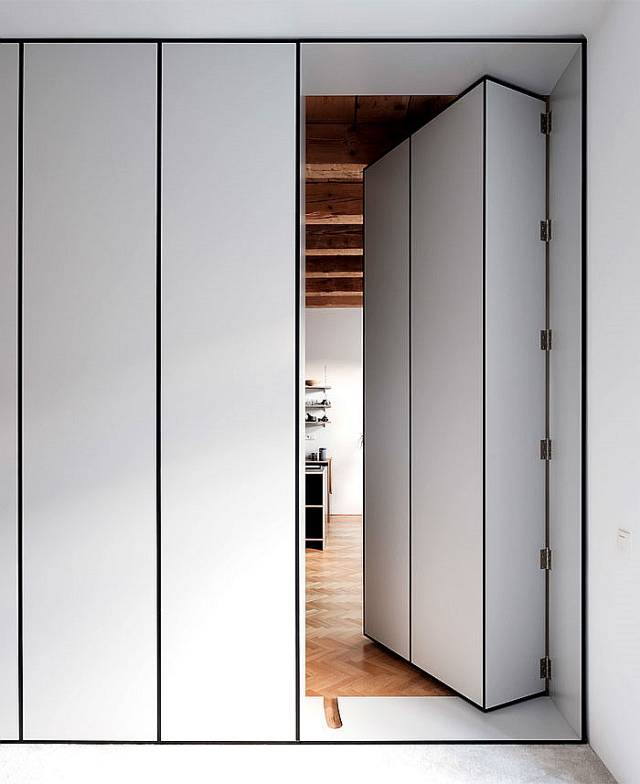 将餐厅门设计成为隐形门主要是满足餐厅的隔断作用,另外餐厅的隐形门